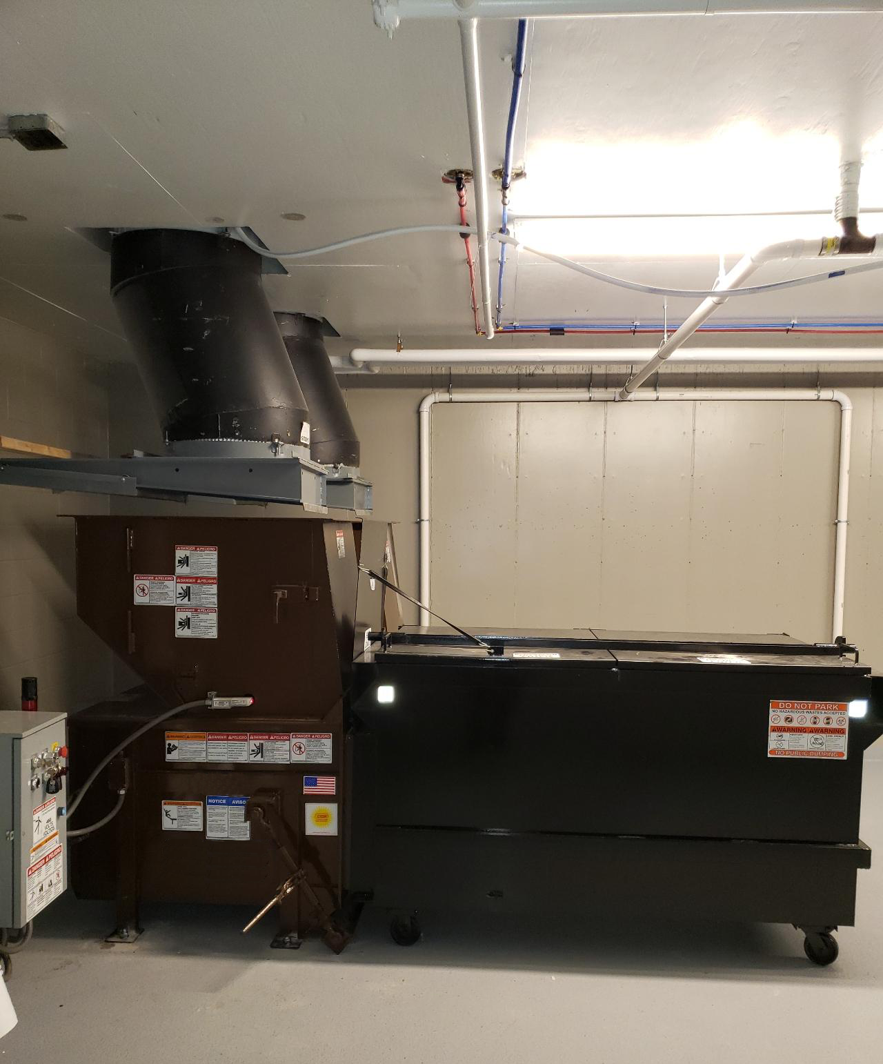 Mini Mac Apartment Compactor. Commercial Trash Compactor meant for high rise buildings that you can put standard household trash in.