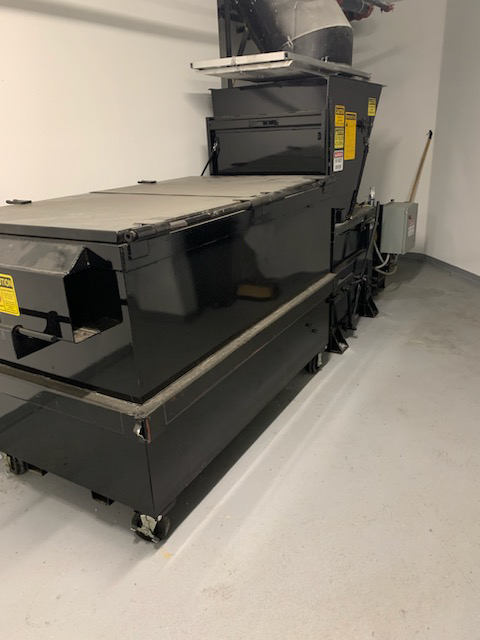 The Apartment Compactor (or Chute Compactor) in this picture is manufactured by Bakers Waste Equipment and installed by Bakers Waste Equipment Compactor Solutions. It comes with a 2 yard (2 YD) receiver container. Bakers Waste Equipment Compactor Solution’s Apartment Compactors are often sold with 2 Yard (2 YD), 3 Yard (3 YD) or 4 Yard (4 YD) compactor receiver containers.