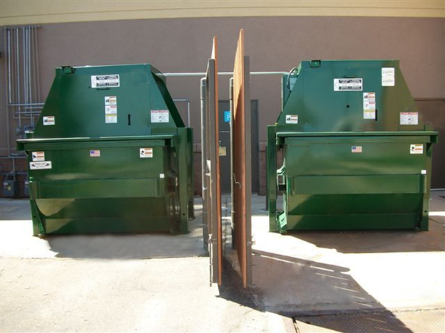 The two Vertical Compactors (or Front Load/Read Load Compactors) in this picture were installed by Bakers Waste Equipment Compactor Solutions. Bakers Waste Equipment Compactor Solutions provides vertical compactors accompanied by a 2 – 8 yard leak-proof mobile container.